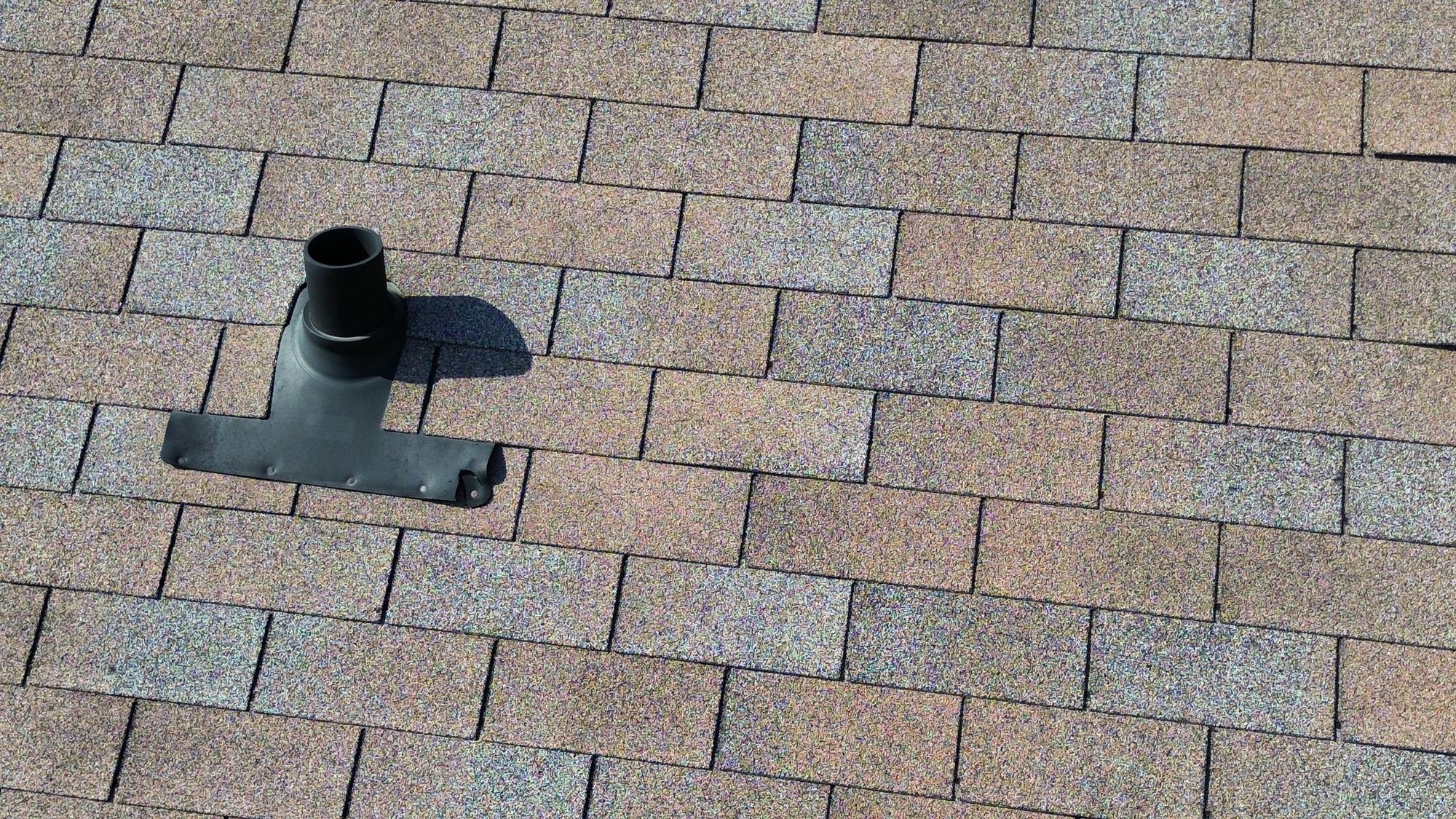 Damaged roof vent flashing and exposed nails found during a Nepean home inspection
